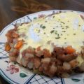 Corned Beef Hash With Poached Eggs Under[...]