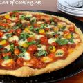 Roasted Tomato Pizza with Fresh Basil and[...]