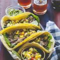 Beer-Braised Pulled Pork Tacos and a Spicy[...]