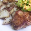 Spicy Pork Chops with Herbed Roasted New[...]
