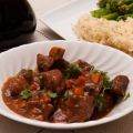 Braised beef in rich tomato and anchovy sauce[...]